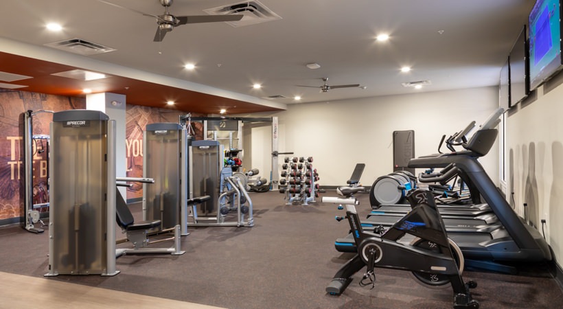 Fitness center has plenty of exercise equipment Fitness center has plenty of exercise equipment